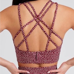 Buff Bunny geo sports bra in ‘vineyard dark red bossy’ size small